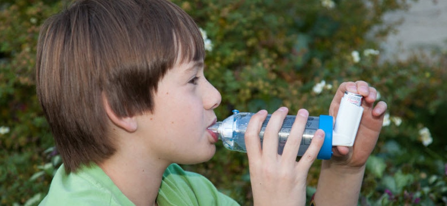 Aerosol doser used by boy